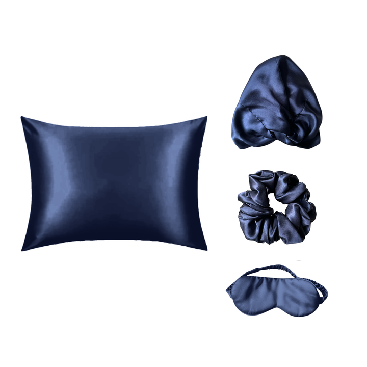 The Silk Rituals Overnight Bundle in French Navy: silk pillowcase, hair bonnet, eye mask and classic scrunchie