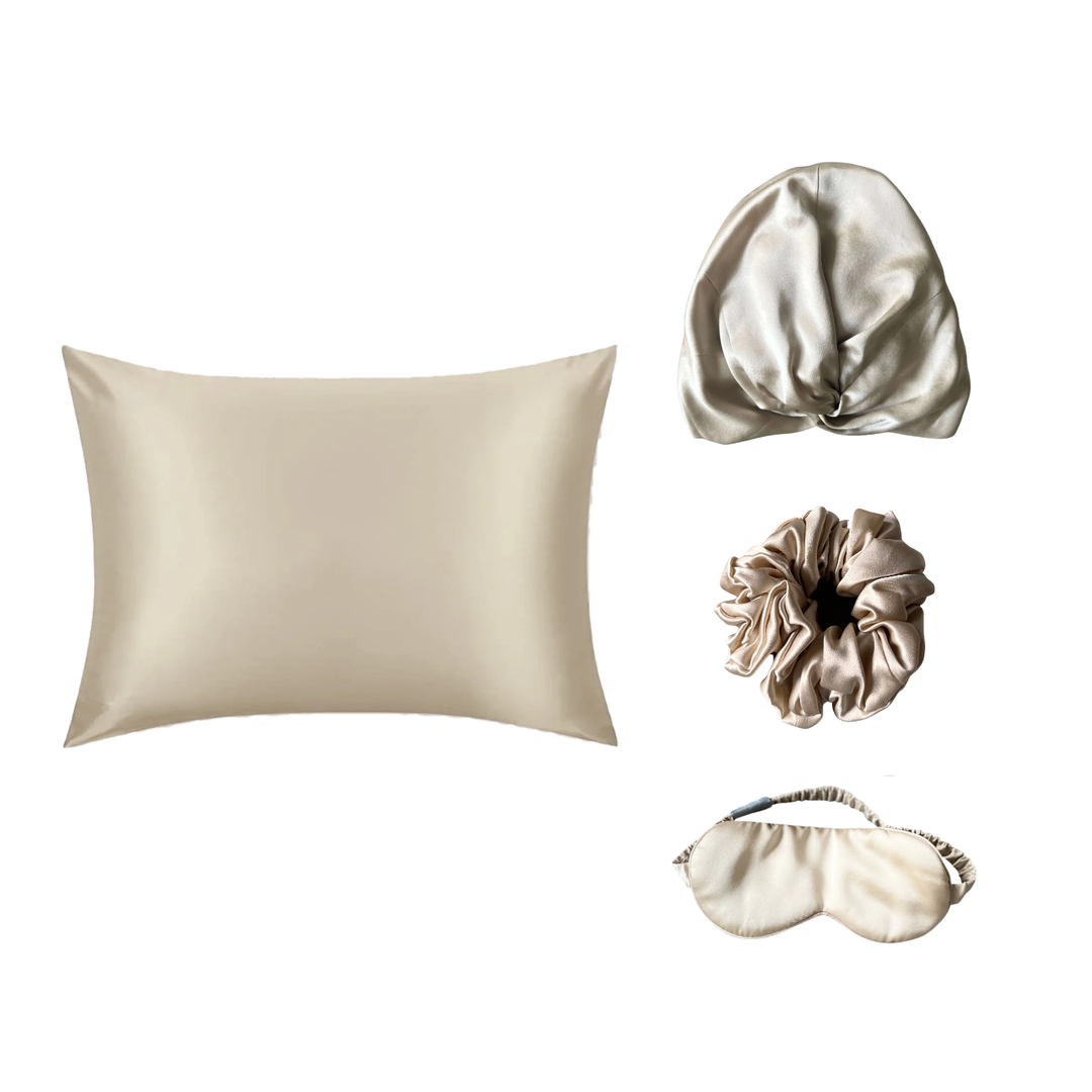 The Silk Rituals Overnight Bundle in Champagne: silk pillowcase, hair bonnet, eye mask and classic scrunchie