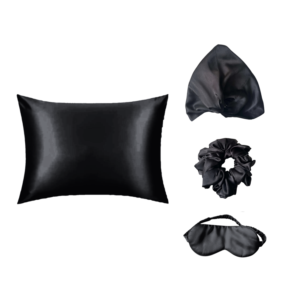 The Silk Rituals Overnight Bundle in Eclipse Black: silk pillowcase, hair bonnet, eye mask and classic scrunchie