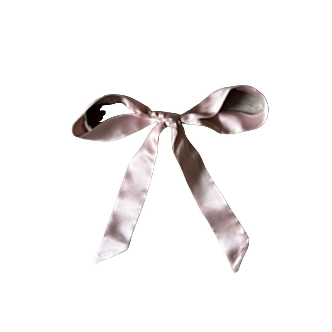 Blush pink 100% mulberry silk hair ribbon tied in a bow