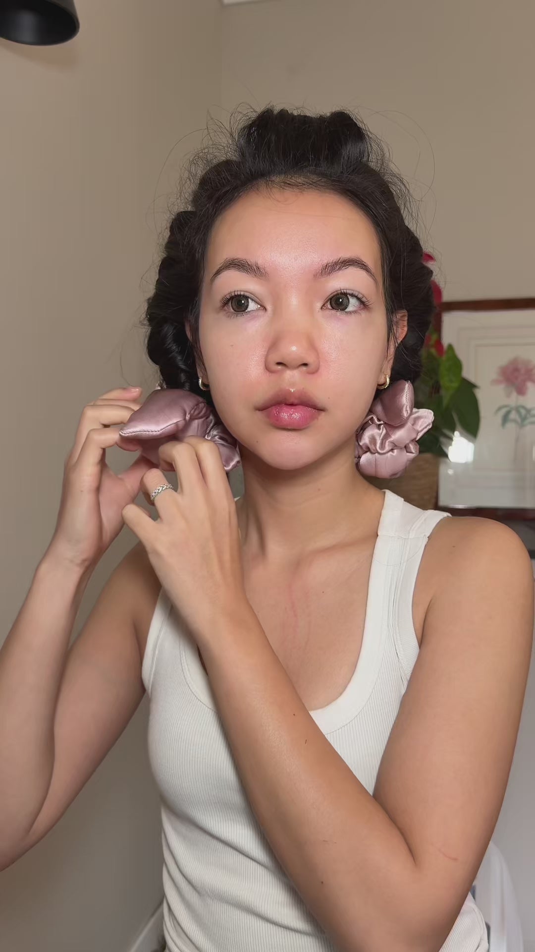 Ploy unwraps the silk heatless curler to reveal soft overnight curls